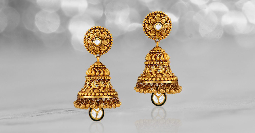 Gold jhumka earrings
