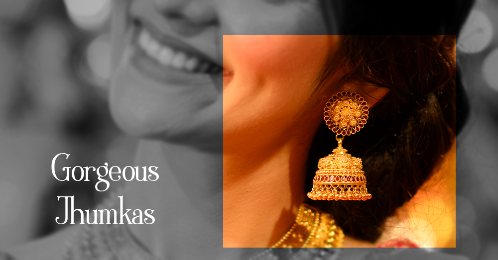 Gold jhumka earrings